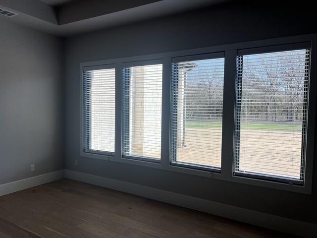 Blinds on a wide triple window